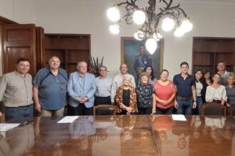 Felipe Michlig con Cooperadores Escolares en el Senado